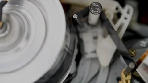 Operation of the film loading and unloading mechanism in a VCR Video stock 306445167