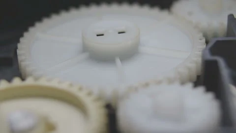 Operation of a gearwheel in the unit of the printer (macro) Stock Footage 85719937