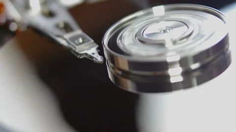 Operation of a hard drive (macro) Stock Footage 85719980
