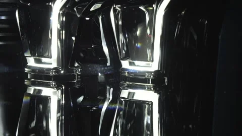 The operation of the head optics of a modern car. Headlights with curtains. Tech Stock Footage 278861359