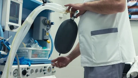 Operation in hospital with using oxygen or anesthesia mask Stock Footage 73259738