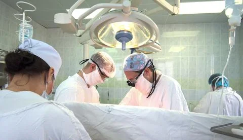 Operation, joint replacement doctors, surgeon, hands, tools, equipment Stock Photos