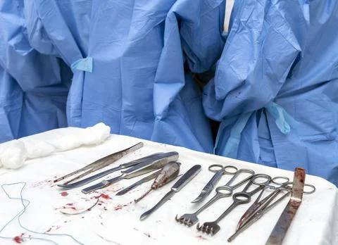 Operation, joint replacement doctors, surgeon, hands, tools, equipment Stock Photos