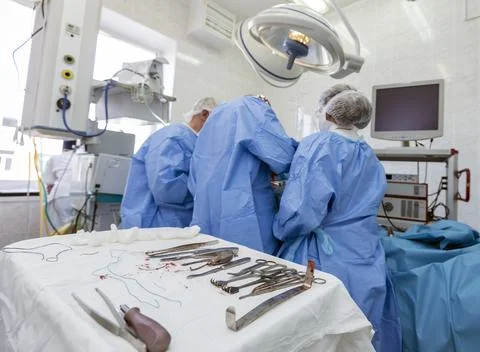 Operation, joint replacement doctors, surgeon, hands, tools, equipment Stock Photos