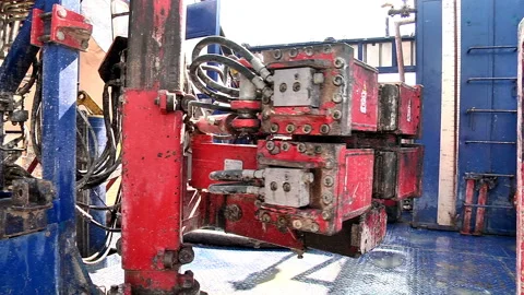 Operation of the mechanism on the drilling platform Stock Footage 96464164