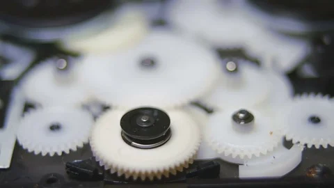 Operation of the mechanism of gear wheels in a player Stock Footage 80781773