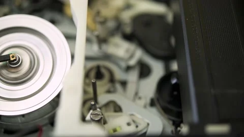 Operation of the mechanism for loading and unloading film in a VHS Video stock 183272609