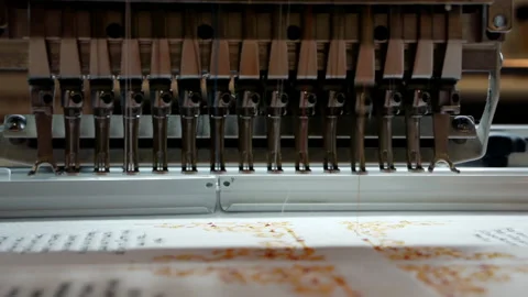 Operation of the production automatic embroidery machine. Stock Footage 149930984