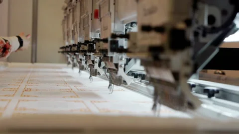 Operation of the production automatic embroidery machine. Video stock 149931037