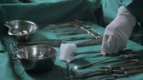 Operation surgical equipment or tools on the medical table being used by doctor. Stock Footage 201722894