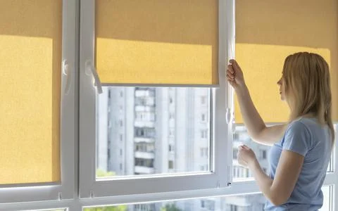 Operation of systems of blinds, roller blinds. Lighting range concept. Stock Photos