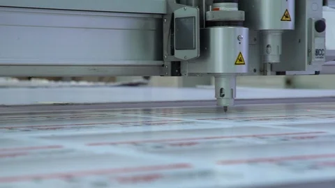 Operation of the tablet cutting plotter. Use in polygraphy. Industrial shooting 動画素材 88396618