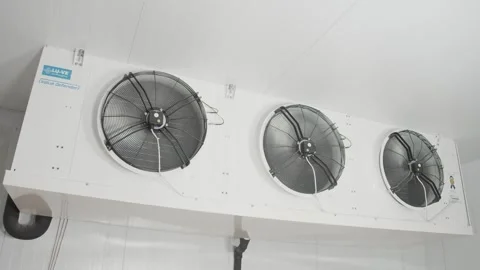Operation of three fans in a refrigeration unit at a factory Stock Footage 253542093