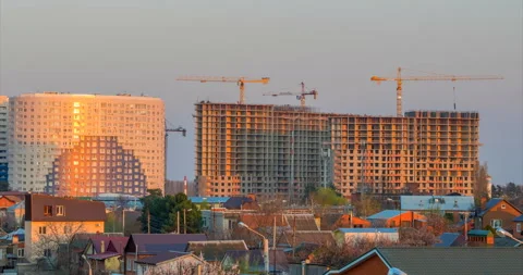 Operation of tower cranes on construction of the building Stock Footage 106294989