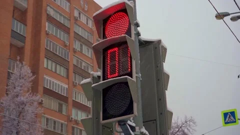 The operation of a traffic light in a snowfall. Stock Footage 174287228