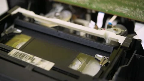 Operation of the video cassette ejection mechanism in a VHS video recorder. Stock Footage 183271044