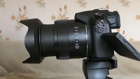 Operation of the zoom on the camera Stock Footage 144859023