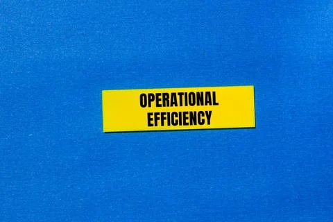 Operational efficiency message written on yellow paper with blue background.  Stock Photos