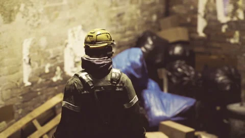 Operative performing rescue amid cluttered storage containers Stock-Footage 339802059