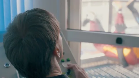 Operator behind the control panel. controlling the force of air flow Stock Footage 91744042