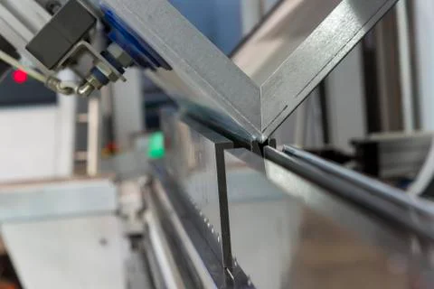 Operator bending metal sheet by sheet bending machine Stock Photos