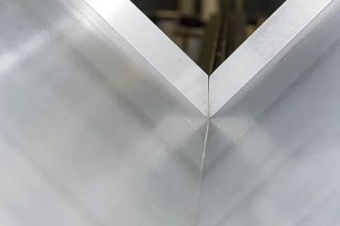 Operator bending metal sheet by sheet bending machine Stock Photos