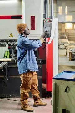 Operator choosing program on computer machine 스톡 사진