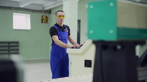 The operator of the CNC machine. Stock Footage 131103281