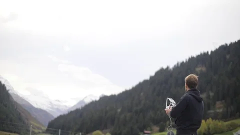 The operator controls the drone Stock Footage 83282524