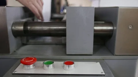 The operator controls the machine in the printing house Stock Footage 78125831