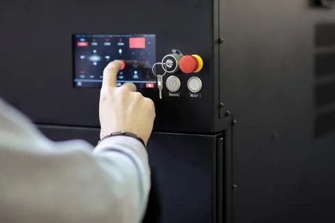 Operator controls modern equipment Stock Photos