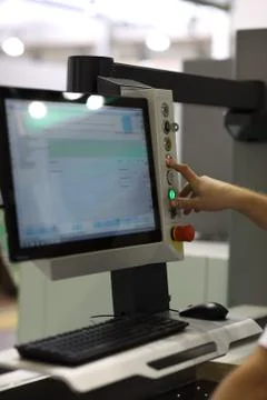Operator controls the work of modern equipment Stock Photos