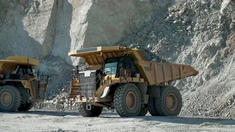 Operator Driving Heavy Dump Truck Mining Equipment At Gold Mining Field, slow Stock-Footage 211773399
