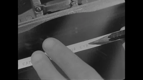 Operator enciphers the message on a paper - 1940 Stock Footage 108041736