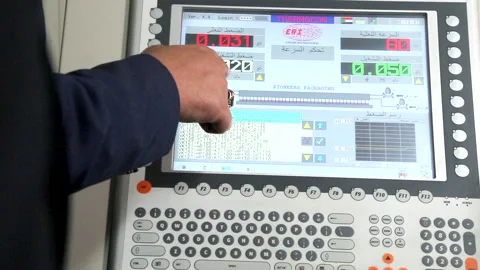 Operator Explains &amp; Points On A Control panel. Selective focus. Stock Footage 145958158