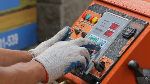 The operator gives the commands to wood cutting machine. Close up Stock Footage 72681217