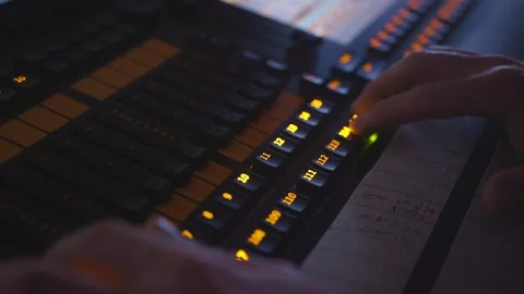 Operator at the lighting control panel Stock Footage 234153395