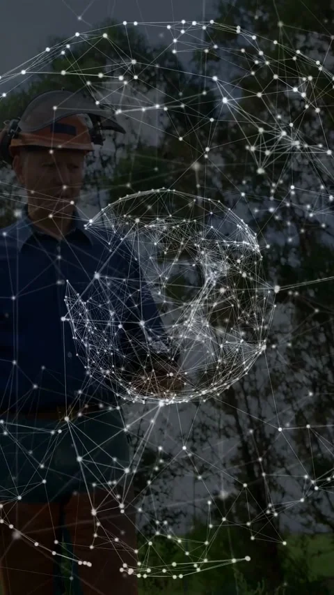 Operator operating controller in wooded area initiating tech AR sphere over Stock Footage 332546875