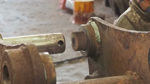 Operator polishing internal axis of part in industrial workshop with an Video stock 197813094