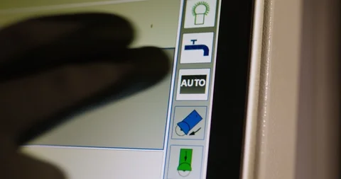 Operator pressing finger on auto and manual computer button. Stock Footage 93107540