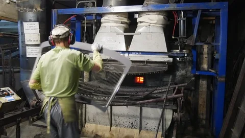 The operator puts the glass on the frame to bend.Tempered glass. 스톡 동영상 123124379