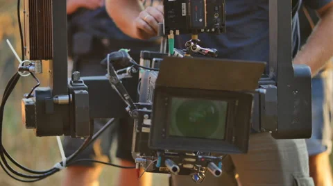 The operator set up the camera before film shoot. Real time capture Stock Footage 61681674
