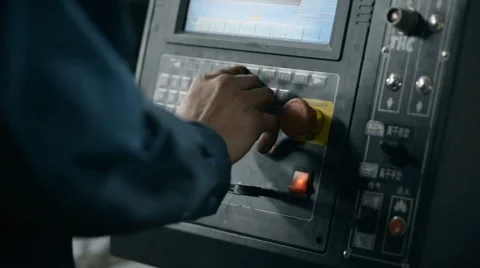 The operator sets the program manufacture technology of flat sheet metal steel Stock Footage 55010886