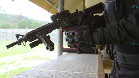 Operator shifting hand and removing rotating seating mag during range training, Stock Footage 332315453