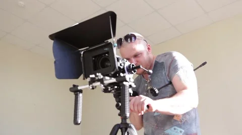 An Operator Shooting On DSLR Kit Video stock 50811060