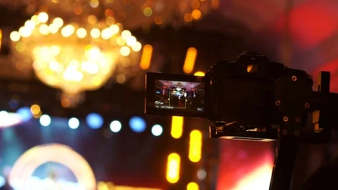 Operator shoots video on camera Stock Footage 118432533