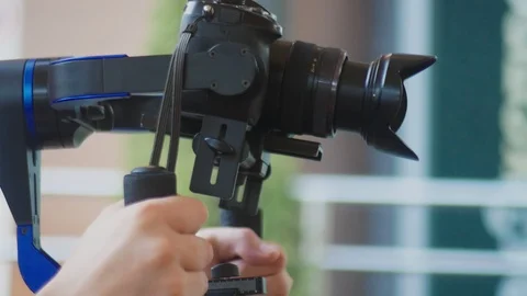 Operator with Steadicam recording video. 4k, close-up Stock-Footage 94771292