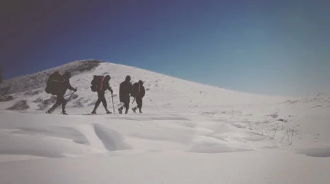 The operator takes on the video climbers in the mountains. Vignette color Video stock 62949593