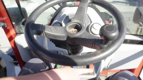 Operator Using Construction Vehicle Controls at Public Works Event in Bordeaux Stock Footage 346050936