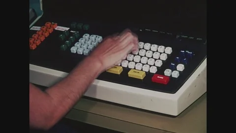 Operator using keyboard of computer at Off Track Betting OTB taking telephone 動画素材 82549924